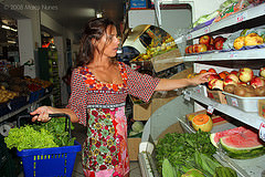 Woman shopping for produce.