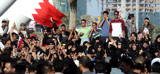 Protesting Bahraini women wear sunglasses, like common whores. 