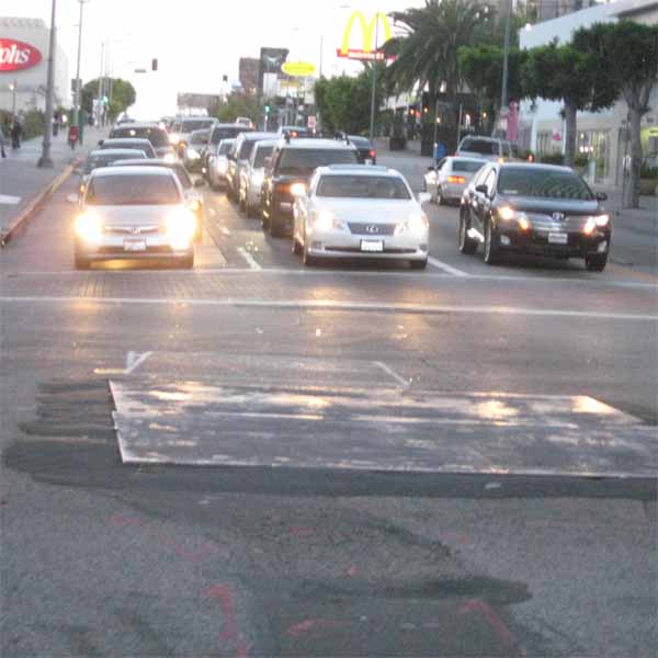 This jagged metal sheet is good enough for Wilshire and Western. It's not like that intersection gets a lot of traffic. 