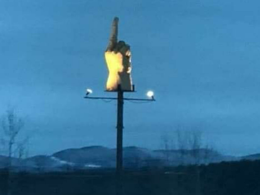 Here's why a Vermont man put up a giant, illuminated middle finger  sculpture on his front lawn