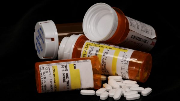 Pain tablets and pill bottles