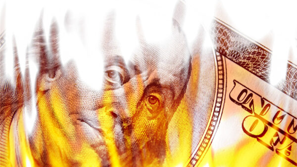 $100 bill on fire