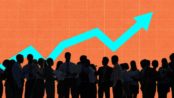 Silhouettes of people against an upward-trending chart