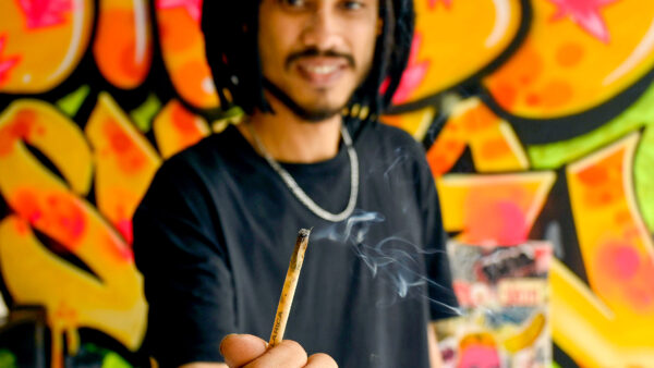 man holding a joint