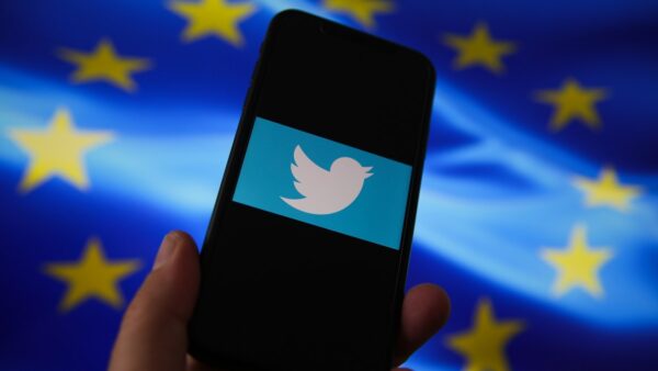 Twitter logo and European Union flag