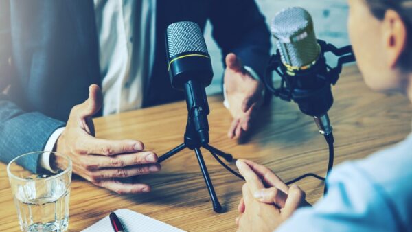 person being interviewed by a radio host