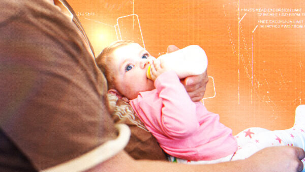 A baby being held