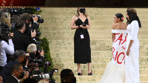 Alexandria Ocasio-Cortez wears a dress that says "Tax the Rich" at the 2021 Met Gala