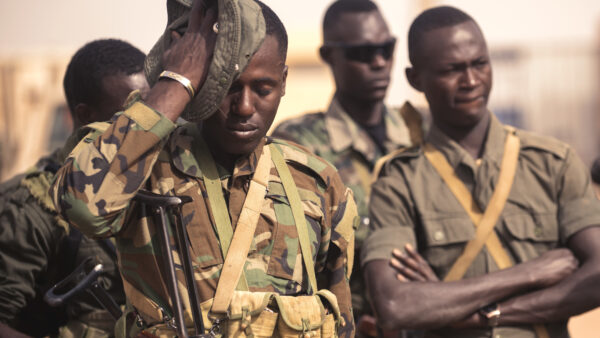 A Nigerien soldier wipes sweat off his face while participating in a special forces training exercise during Exercise Flintlock 2018 in Agadez, Niger, April 14, 2018.
