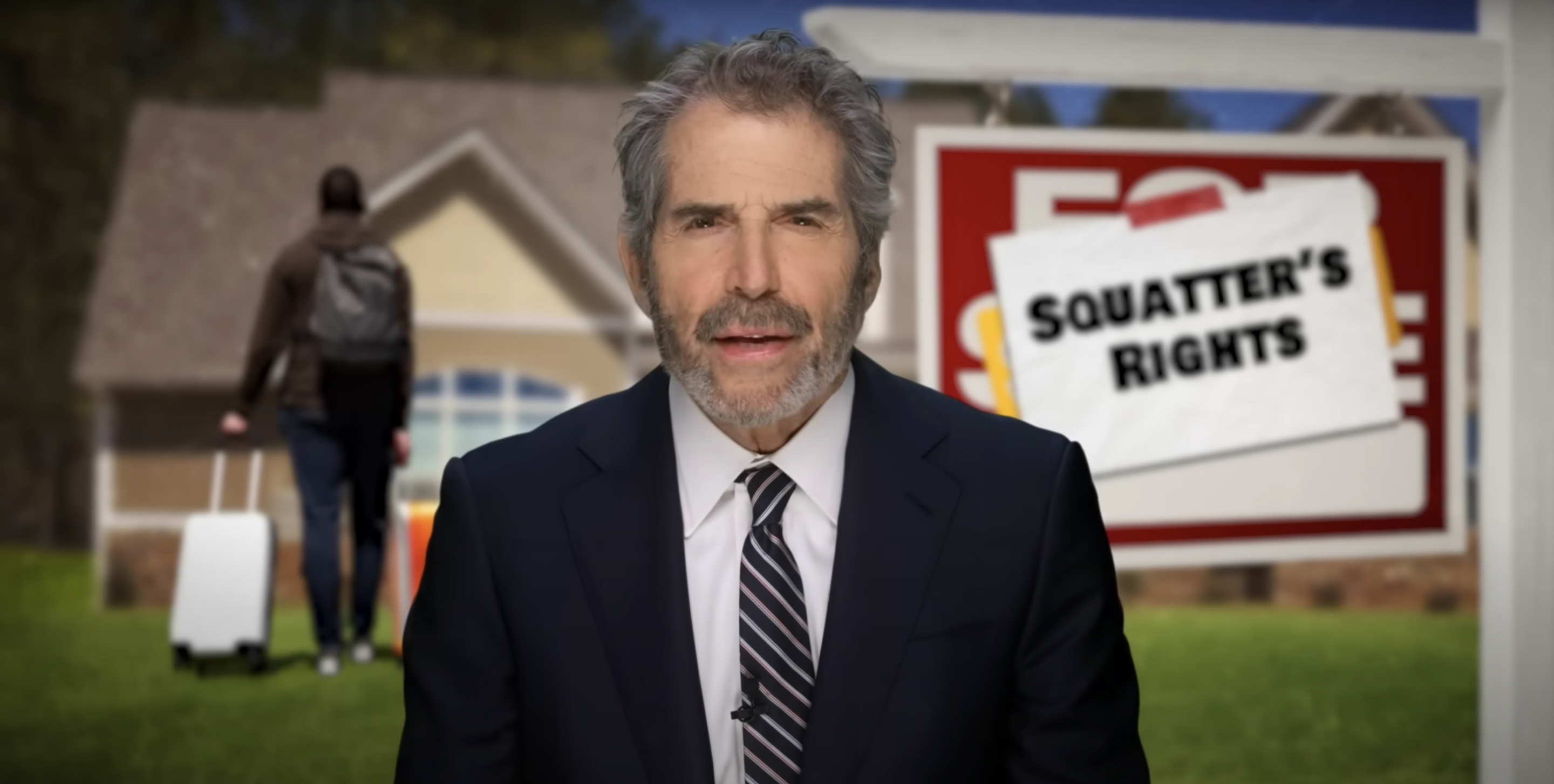 John Stossel stands in front of a "squatter's rights" sign