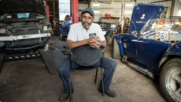 Hinga Mbogo is seen in his auto repair shop