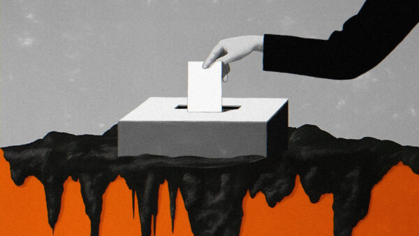 Graphic of a hand placing a voting card into a ballot box