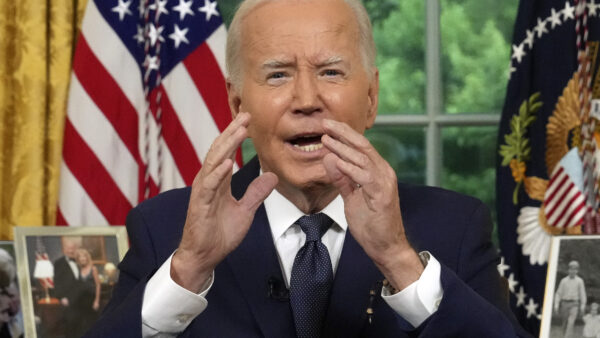President Joe Biden speaking in the Oval Office
