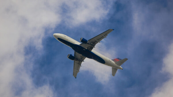 A plane in the air shortly after taking off.