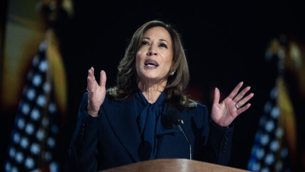 Kamala Harris speaking at a podium
