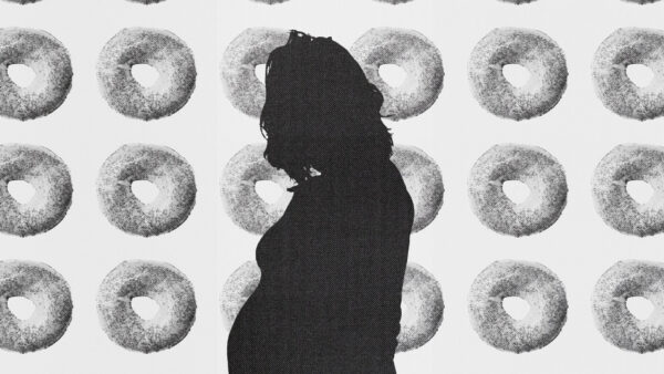 Pregnant woman poppy seed bagel