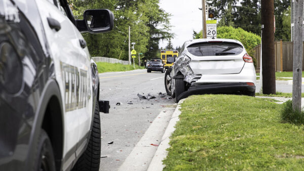 Car crashed in a school zone in front of sheriffs car