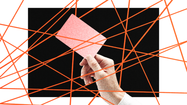 A hand holds a permit surrounded by a web of red tape
