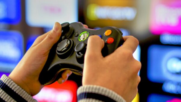 Someone using a video game controller