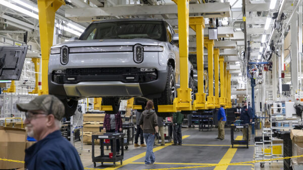An assembly line of Rivian R1T pickup trucks, at its factory in Normal, Illinois.