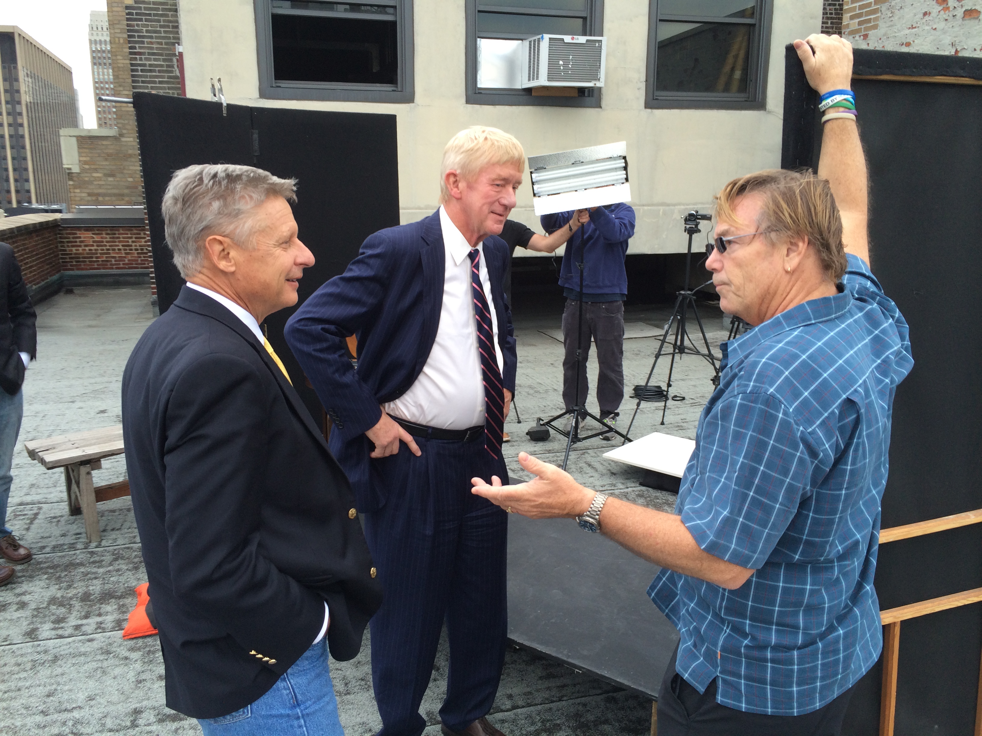 Gary Johnson and Bill Weld with a supporter on the night of the first presidential debate. ||| Matt Welch